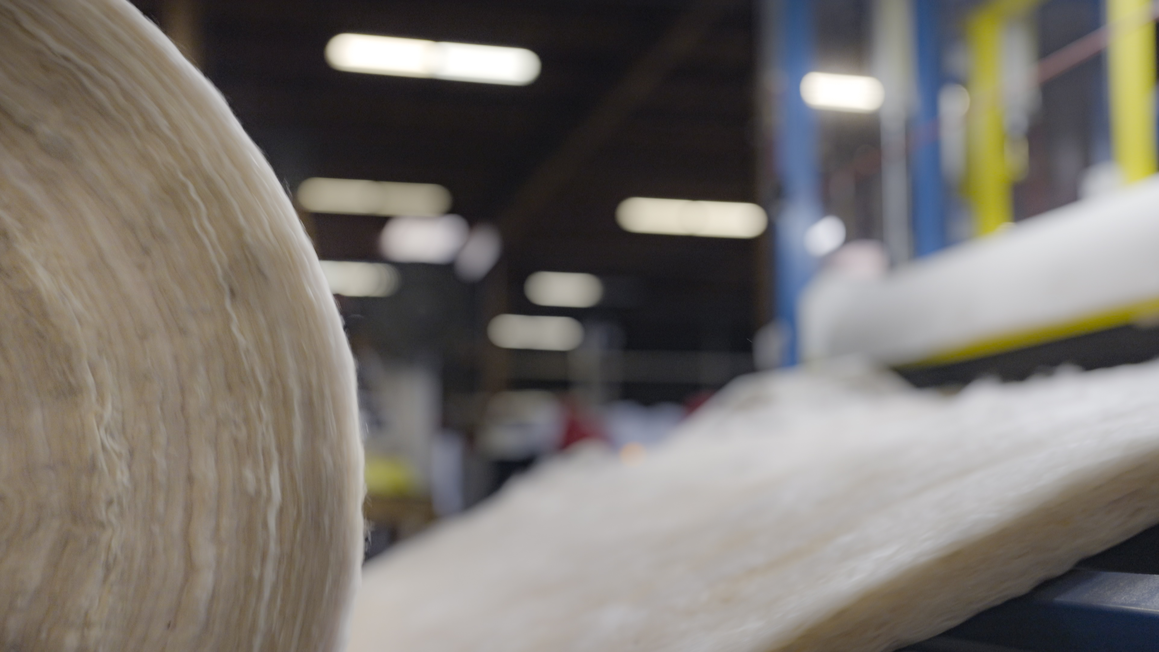 Photo of a roll of MBI INsulation being produced